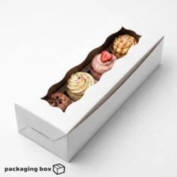 White 4 cupcake long box with scalloped clear window holding assorted decorated cupcakes