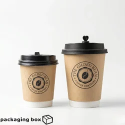 Two sizes of imported brown kraft double wall paper coffee cups with black lids showing custom