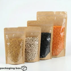 Brown paper kraft bags with clear transparent front window in 4 sizes filled with grains, beans, black sesame and red lentils – eco-friendly standup pouches with zip lock by Packaging Box Pakistan