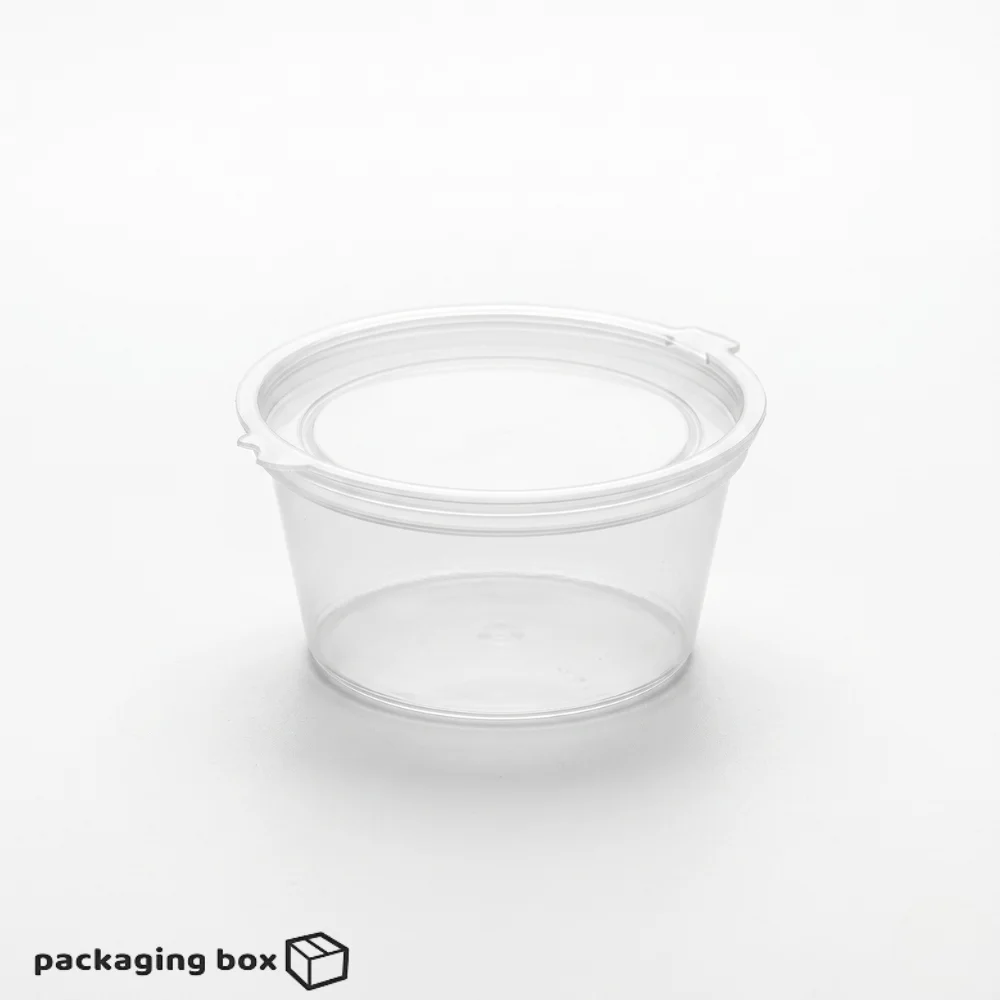 Clear plastic disposable dip sauce containers with attached flip lids filled with ketchup chutney and mayo sauce