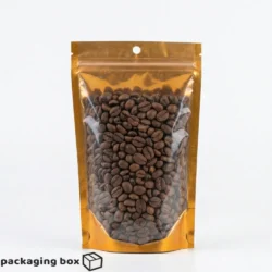 Front transparent copper gold aluminium standup pouch with coffee beans lentils peppercorns almonds and green peas