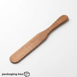 Hygienic wooden wax spatula resting on open glass jar with wax, cork lid and dried rose petals on white background