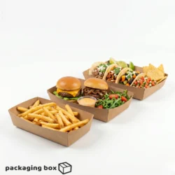 Kraft food tray with grilled salmon, potato wedges, cherry tomatoes, salad and dressing jar