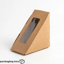 Kraft brown triangle sandwich box with clear window for cafes, bakeries and food delivery packaging in Pakistan.