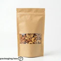 Brown kraft standup pouches in multiple sizes with clear window showing mixed nuts, dried fruits and trail mix – eco-friendly resealable food packaging bags