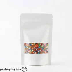 White Kraft Standup Pouch with clear window showing colorful candy