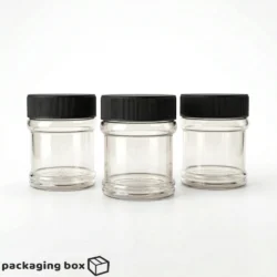 Three empty clear round plastic jars 250g with black screw top lids by packagingbox pk for food spice and dry goods storage