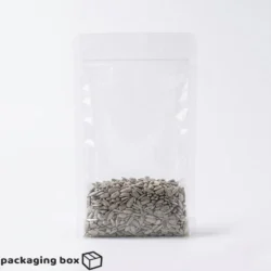 Transparent flat bottom side gusseted pouch filled with sunflower seeds
