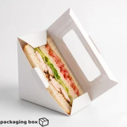 White kraft triangle sandwich box with clear window for eco-friendly food packaging in Pakistan.