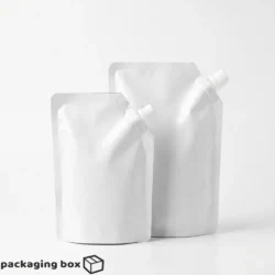 White matte standup spout pouch in two sizes – premium liquid and beverage packaging bags with screw cap spout