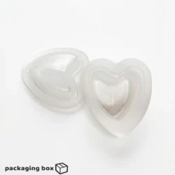 Two Heart Jelly Cups filled with vibrant mixed fruit jelly including strawberry, mango, kiwi and blueberry — by PackagingBox.pk